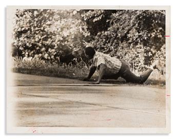 (CIVIL RIGHTS.) Pair of press photographs of the shooting of James Meredith on the March Against Fear.